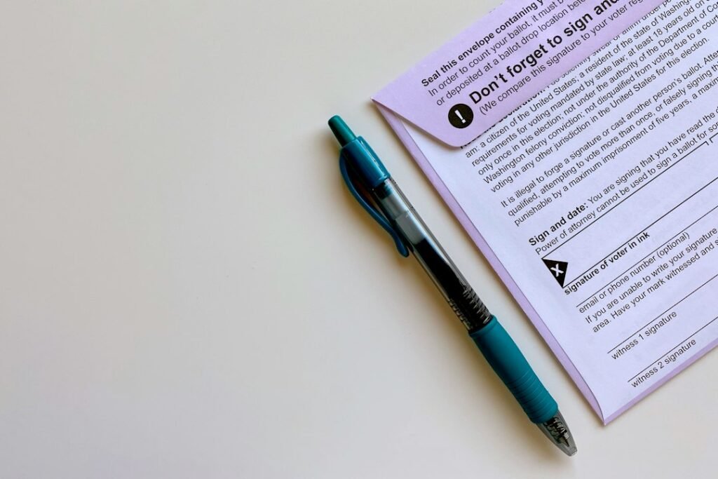 Ballot envelope and pen illustrating political polling and voter research